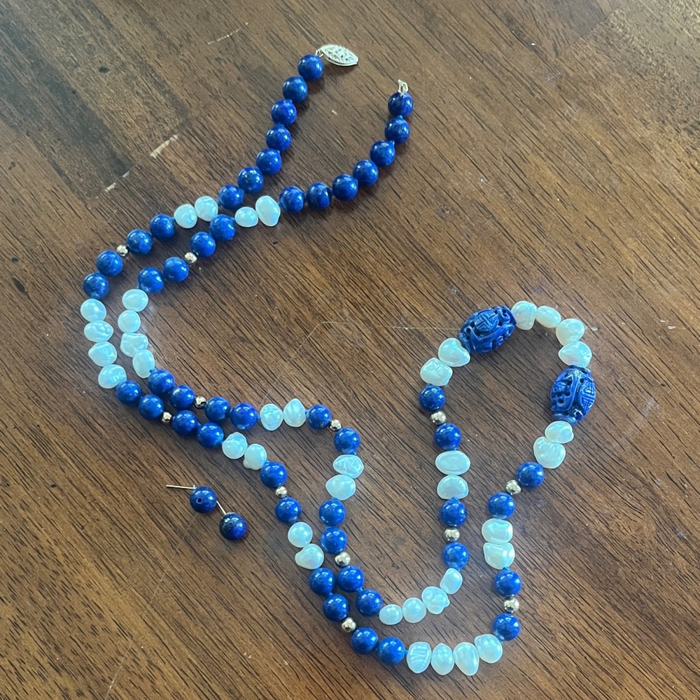 Blue jade and pearl necklace with a 14k clasp and matching stud earrings
